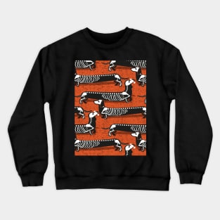 Spooktacular long dachshunds skeleton // pattern // orange background skeleton dogs Crewneck Sweatshirt